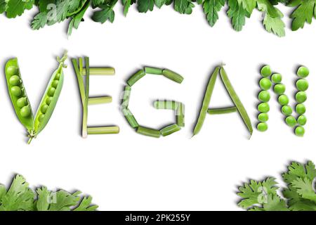 Word VEGAN made of different fresh tasty vegetables on white background, flat lay Stock Photo