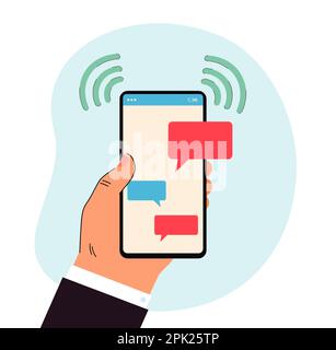 Hand holding smartphone with blank speech bubbles for chat comments ...