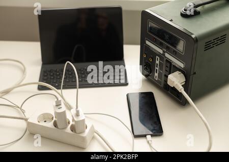portable charging station charges gadgets Stock Photo