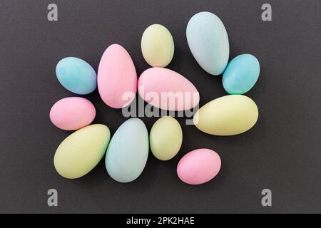 Pastel color Easter Eggs on a grey background. Stock Photo
