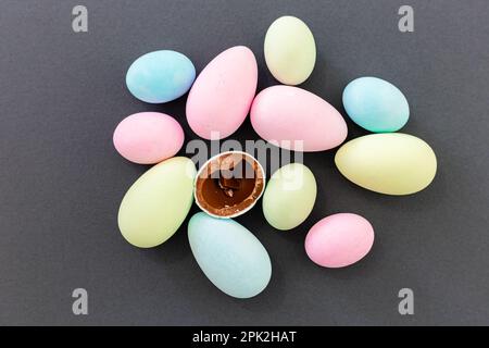 Pastel color Easter Eggs on a grey background. Stock Photo