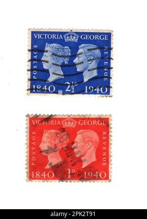 King George VI postage stamps from around the world isolated on a white ...