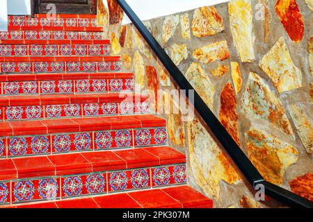 Terracotta stairs . Stair tiles . Rustic house entrance with authentic quarry tiles Stock Photo