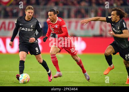 Leroy SANE, FCB 10  compete for the ball, tackling, duel, header, zweikampf, action, fight against Lucas Höler, FRG 9 Kiliann Sildillia, FRG 25  in the match FC BAYERN MUENCHEN - SC FREIBURG 1-2 DFB-Pokal, German Football Cup, Quarterfinal on Apr 04, 2023 in Munich, Germany. Season 2022/2023,, FCB, München, Munich, © Peter Schatz / Alamy Live News    - DFB REGULATIONS PROHIBIT ANY USE OF PHOTOGRAPHS as IMAGE SEQUENCES and/or QUASI-VIDEO - Stock Photo