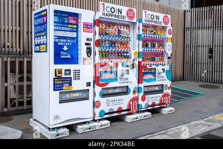 March 13th 2023 - Tokyo, Japan: Typical 1 coin happiness vending machines on a Tokyo street, Japan Stock Photo