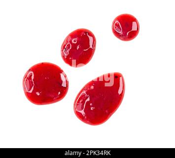 Four round drops of red berry sauce or jam isolated on white background Stock Photo