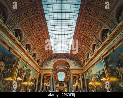 Beautiful architectural details of the Gallery of Great Battles in the palace of Versailles, France. The largest room in the castle, golden ornaments Stock Photo