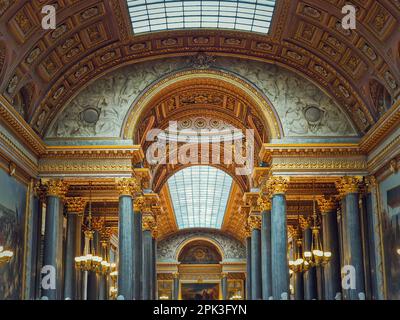 Beautiful architectural details of the Gallery of Great Battles in the palace of Versailles, France. The largest room in the castle, golden ornaments, Stock Photo