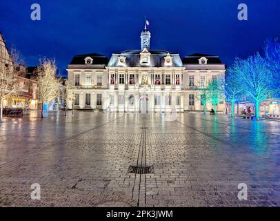 The hotel de ville in Troyes, France, standing resplendent on a damp March evening Stock Photo