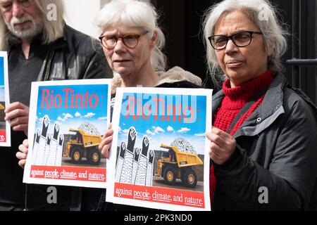 London, UK. 5th April 2023. London Mining Network protest outside the UK office of Rio Tinto, staging a mock trial of the environmental and human impa Stock Photo