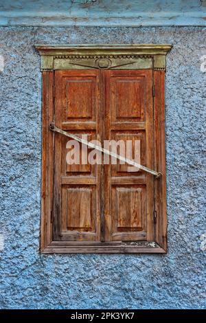 Old shuttered window, close up Stock Photo