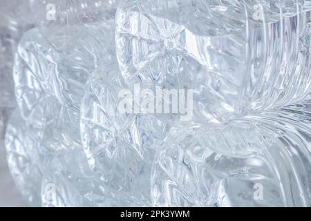 Water in plastic bottles closeup, background Stock Photo
