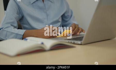 Marketing team using laptop working in company Stock Photo