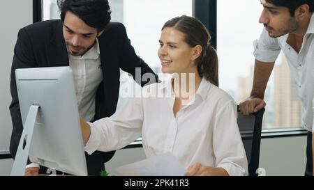 Happy employees working together at high building office Stock Photo