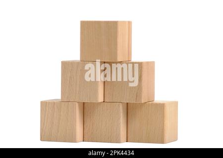 Pyramid of wooden cubes white background Stock Photo