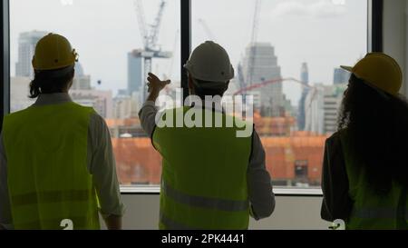 Group of professional civil engineers team working on new building Stock Photo