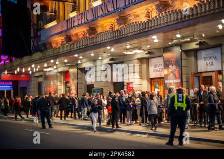 Theatrelovers mob the Lunt-Fontanne Theatre in the Theater District in New York to enter to see the revival of “Sweeney Todd: The Demon Barber of Fleet Street” on Wednesday, March 29, 2023. The well received Stephen Sondheim musical premiered on Broadway in 1979 and this is its first Broadway revival. (© Richard B. Levine) Stock Photo