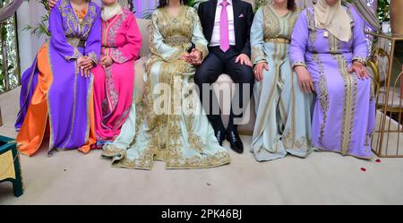 Moroccan bride and groom. The bride wears the Moroccan caftan and the groom wears the Moroccan djellaba Stock Photo