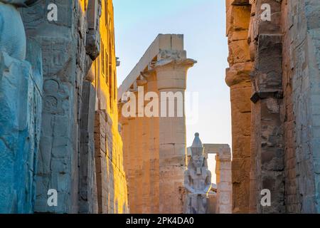 The Colossus of Ramesses ll in the First Court, Luxor Temple, Luxor, Egypt, North East Africa Stock Photo