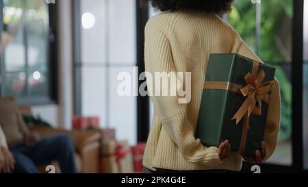 Happy family celebrating Christmas day together at home Stock Photo