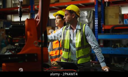 Engineer team working together in the industrial manufacturing Stock Photo