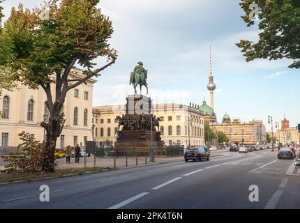 Unter den Linden Boulevard with Frederick the Great Statue and Fernsehturm TV Tower - Berlin, Germany Stock Photo