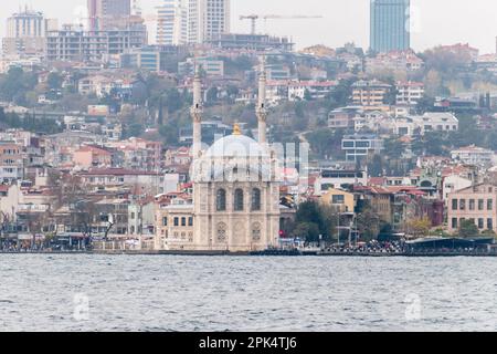 Istanbul, Turkey - December 10, 2022: Ortakoy Mosque (Turkish: Ortakoy Camii) known also as Buyuk Mecidiye Camii. Stock Photo