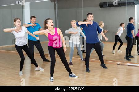 People practicing vigorous dance Stock Photo