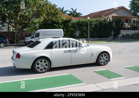 Miami, Florida USA - April 15, 2021: 2011 Rolls-Royce Ghost white car, side view Stock Photo