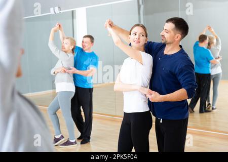 People practicing bachata movements Stock Photo