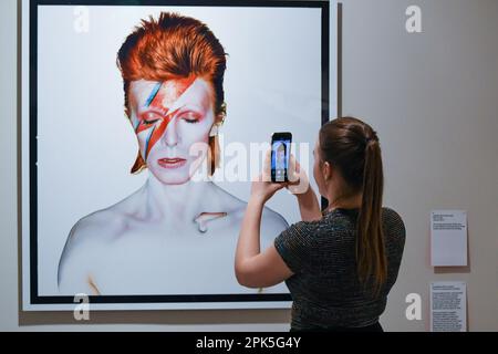 London, UK, 6th Apr 2023, Its fifty years since the launch of Aladdin Sane album by David Bowie. The photographer Brian Duffy collaborated with David Bowie to create the iconic lightning flash portrait. It explores the creation of the artwork, as well as a stellar line-up of live music and talks inspired by the album. This exhibition runs from 6th April to 28th May 2023 at Southbank Centre., Andrew Lalchan Photography/Alamy Live News Stock Photo