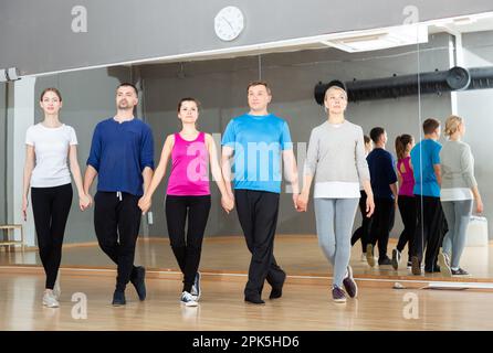 People fulfilling Celtic dance movements Stock Photo