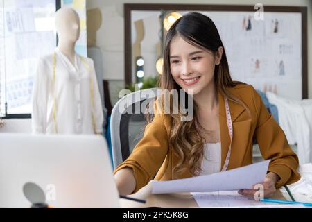 Female designer business owner, Tailoring business owner Stock Photo