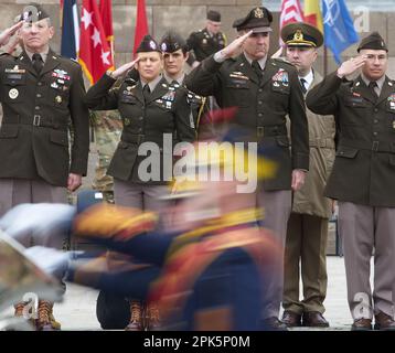 Bucharest, Romania. 5th Apr, 2023: Joseph McGee, (L), commanding major general of the 101st Airborne Division, and Gregory Anderson (C-R), commanding major general of the 10th Mountain Division, salute the soldiers in the military parade at the end of the transfer of authority ceremony between the 101st Airborne Division (Air Assault) and the 10th Mountain Division, both of the US Army, at the Heroes of the Fatherland Monument in front of the Carol I National Defence University. Credit: Lucian Alecu/Alamy Live News Stock Photo