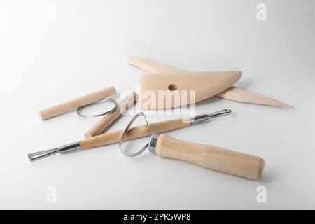 Set of Clay Modeling Tools on White Background, Flat Lay Stock