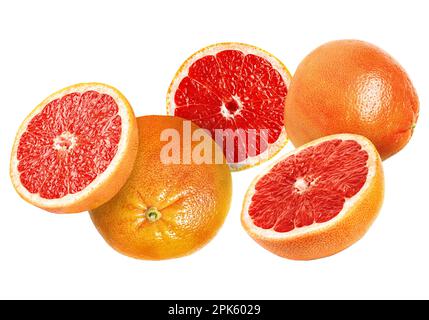 Tasty ripe grapefruits falling on white background Stock Photo