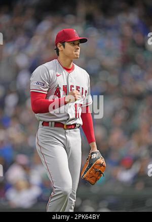 Los Angeles Angels two-way player Shohei Ohtani (L) shakes hands with  Seattle Mariners player instructor Ichiro Suzuki before a baseball game in  Seattle, Washington, on April 3, 2023. (Kyodo)==Kyodo Photo via Credit