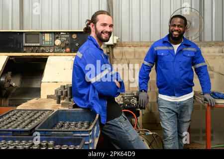 Engineer technician controlling robotic arms on computer laptop Stock Photo