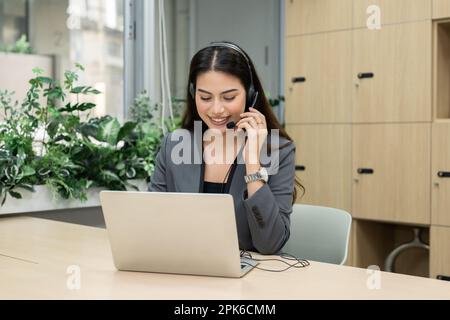 Professional businesswoman working in meeting room at office Stock Photo