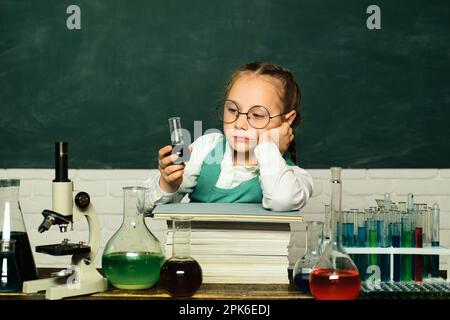 My chemistry experiment. Little kids scientist earning chemistry in school lab. Little children at school lesson. School concept. Stock Photo