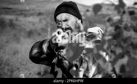 Autumn hunting season. Close up snipers carbine at the outdoor hunting. Hunter with shotgun gun on hunt. Hunting without borders. Poacher in the Stock Photo
