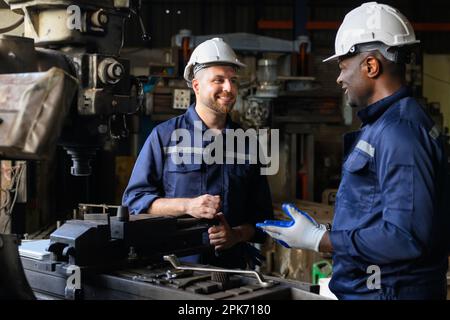 Two industrial engineers team with safety uniform  Stock Photo