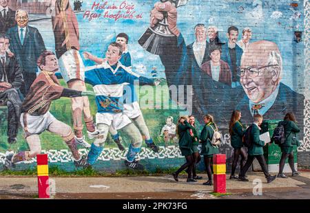 Secondary school pupils walking to school in West Belfast, County Antrim, Northern Ireland, UK Stock Photo