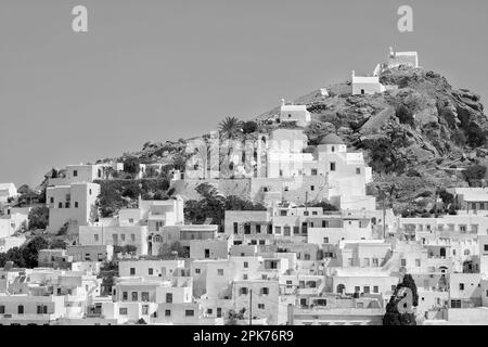 Panoramic view of the picturesque and whitewashed island of Ios Greece in black and white Stock Photo