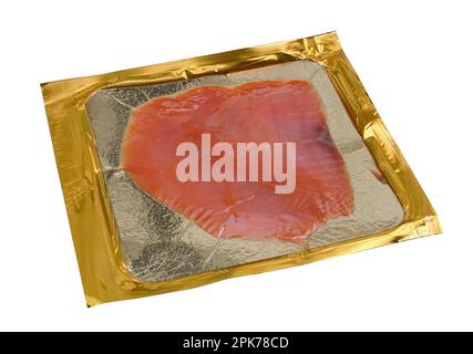One hundred grams of elite smoked salmon in golden vacuum packaging. Isolated on white Stock Photo