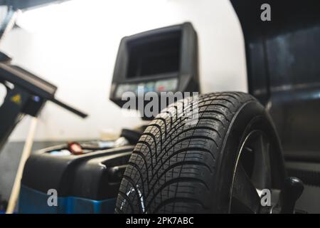 Wheel Balance Process Process of wheel balancing at car service, transport concept Stock ...