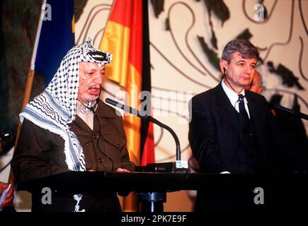 ARCHIVE PHOTO: Joschka Fischer turns 75 on April 12, 2023, Yasser ARAFAT, Palestinian politician, Palestinian President, President of the Palestinian Executive Authority, Chairman of the Palestinian Liberation Organization PLO, co-founder and leader of the underground organization Al Fatah, at the lectern, next to him Federal Foreign Minister Joschka FISCHER, Germany; landscape format; on 02/05/1999 Stock Photo