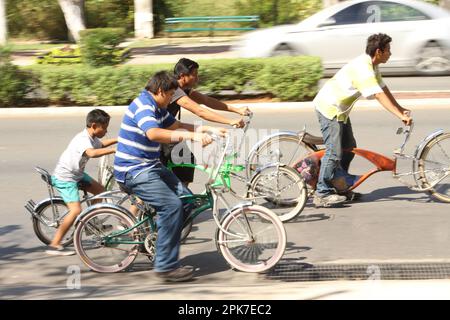 MERIDA, MEXICO - OCTOBER 23, 2016 Sunday cycling on the  Paseo de Montejo - silver customized bicycles Stock Photo