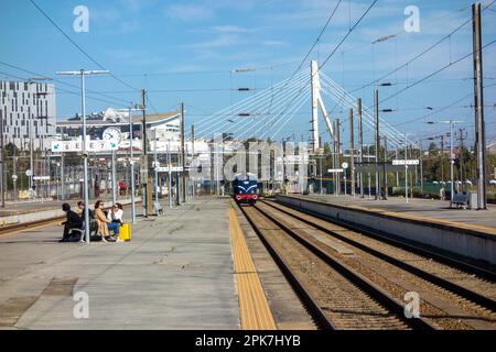 PORTO, PORTUGAL - NOVEMBER 1, 2022 Campanha Train Station with a blue engine just pulling in Stock Photo