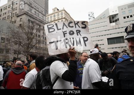New York, United States. 03rd Apr, 2023. A Pro-Trump supporter holds a placard reading 'Blacks for Trump' during a demonstration outside Trump Tower in support of Donald Trump prior to Trump's indictment by the Manhattan D.A. (Photo by Catherine Nance/SOPA Images/Sipa USA) Credit: Sipa USA/Alamy Live News Stock Photo